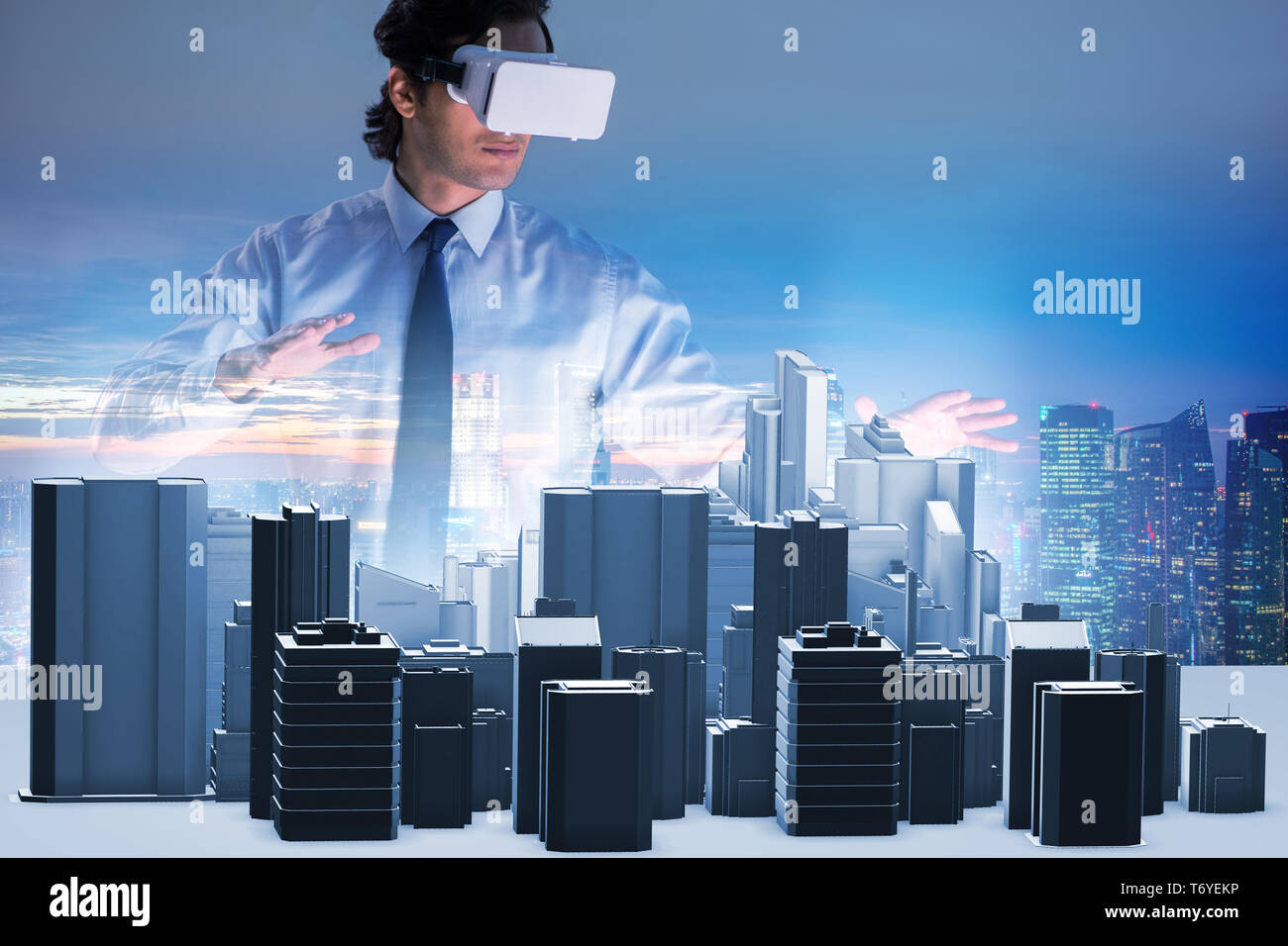 Man with virtual reality goggles doing urban planning Stock Photo