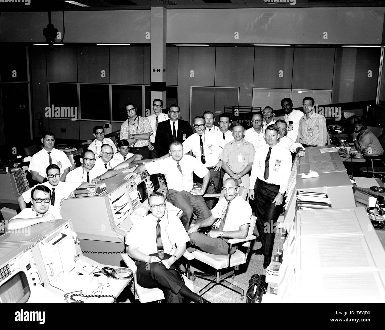 Photograph of the Mission Control Center flight support team for the Apollo 7 mission, Houston, Texas, December 19, 1968. Image courtesy National Aeronautics and Space Administration (NASA). () Stock Photo