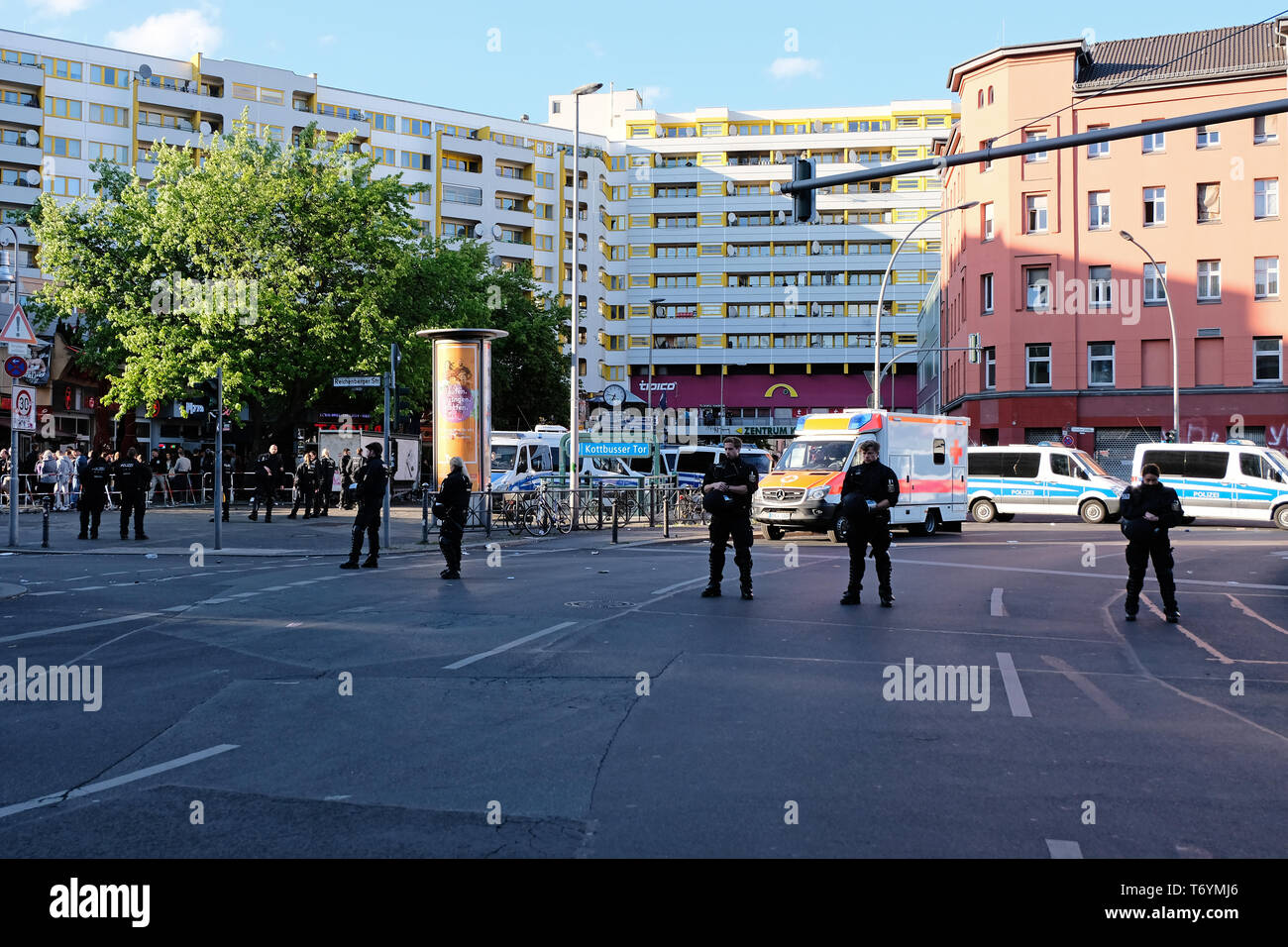Berlin, Germany - May 01, 2018: Some policemen and police vehicles block the Kottbusser Tor square in Kreuzberg. May Day in Berlin Kreuzberg refers to Stock Photo