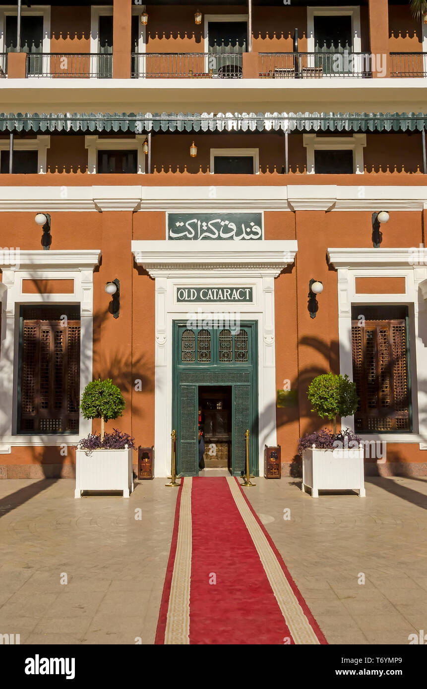 Sofitel Legend  Old Cataract Hotel main entrance with palm tree covered path, Aswan, Egypt Stock Photo
