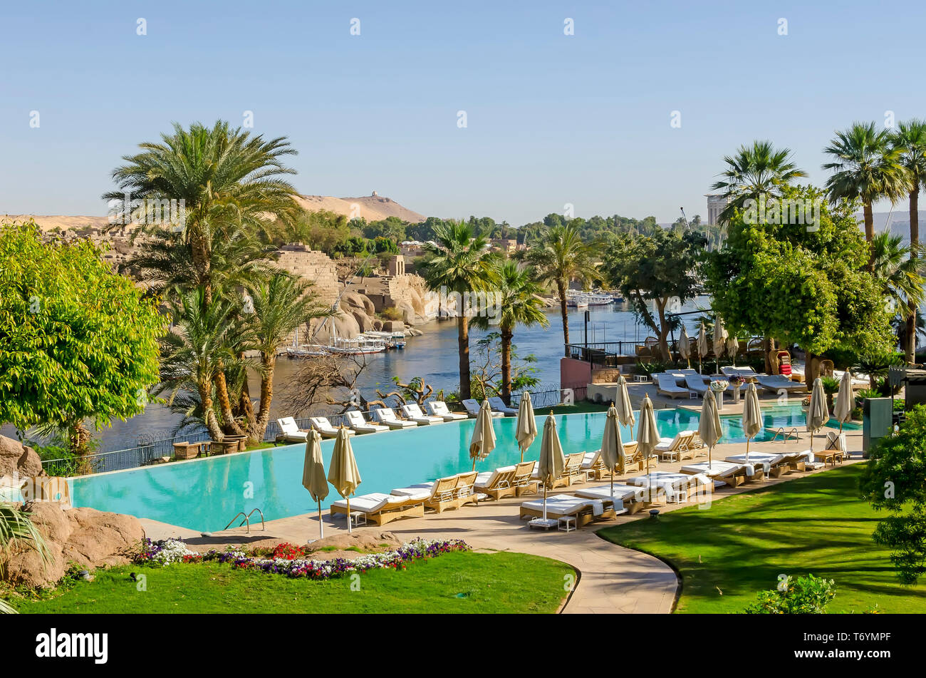 Sofitel Legend Old Cataract Hotel swimming pool overlooking  River Nile, Aswan, Egypt Stock Photo
