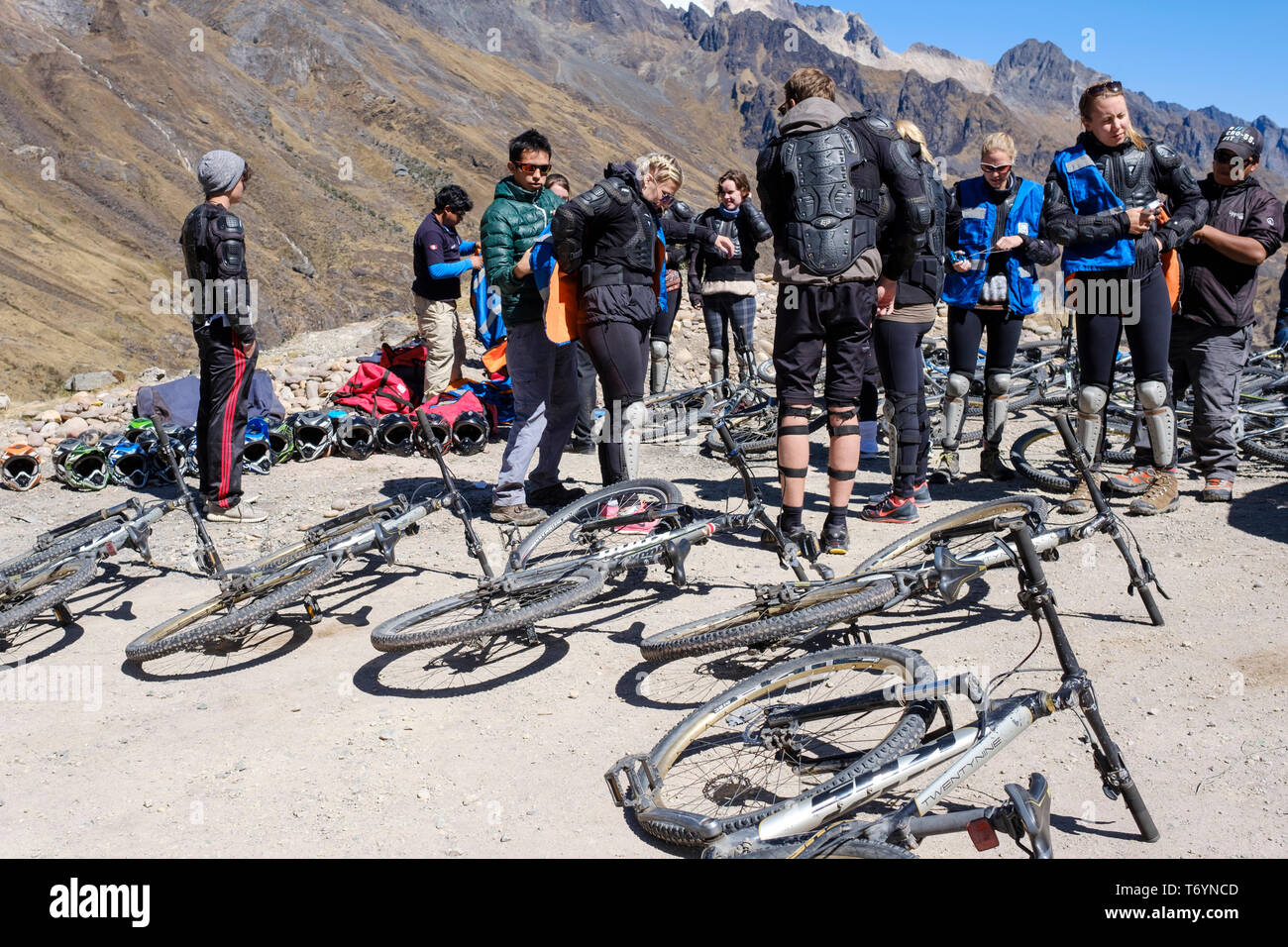 People getting ready for an exciting downhill ride on mountain bike in the Cusco Region of Peru Stock Photo