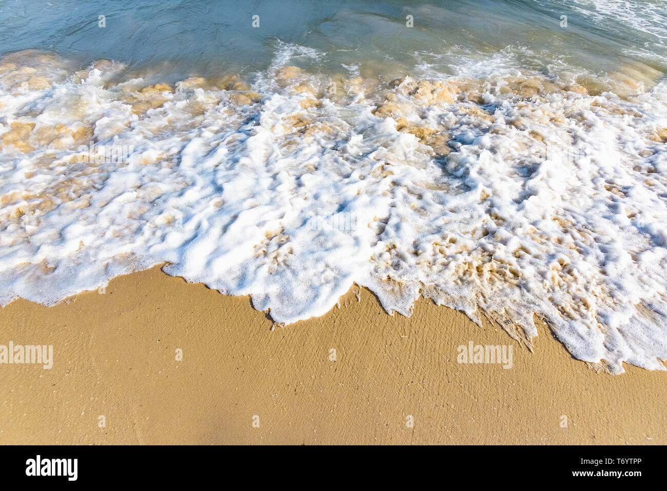 sea sand beach wave Stock Photo