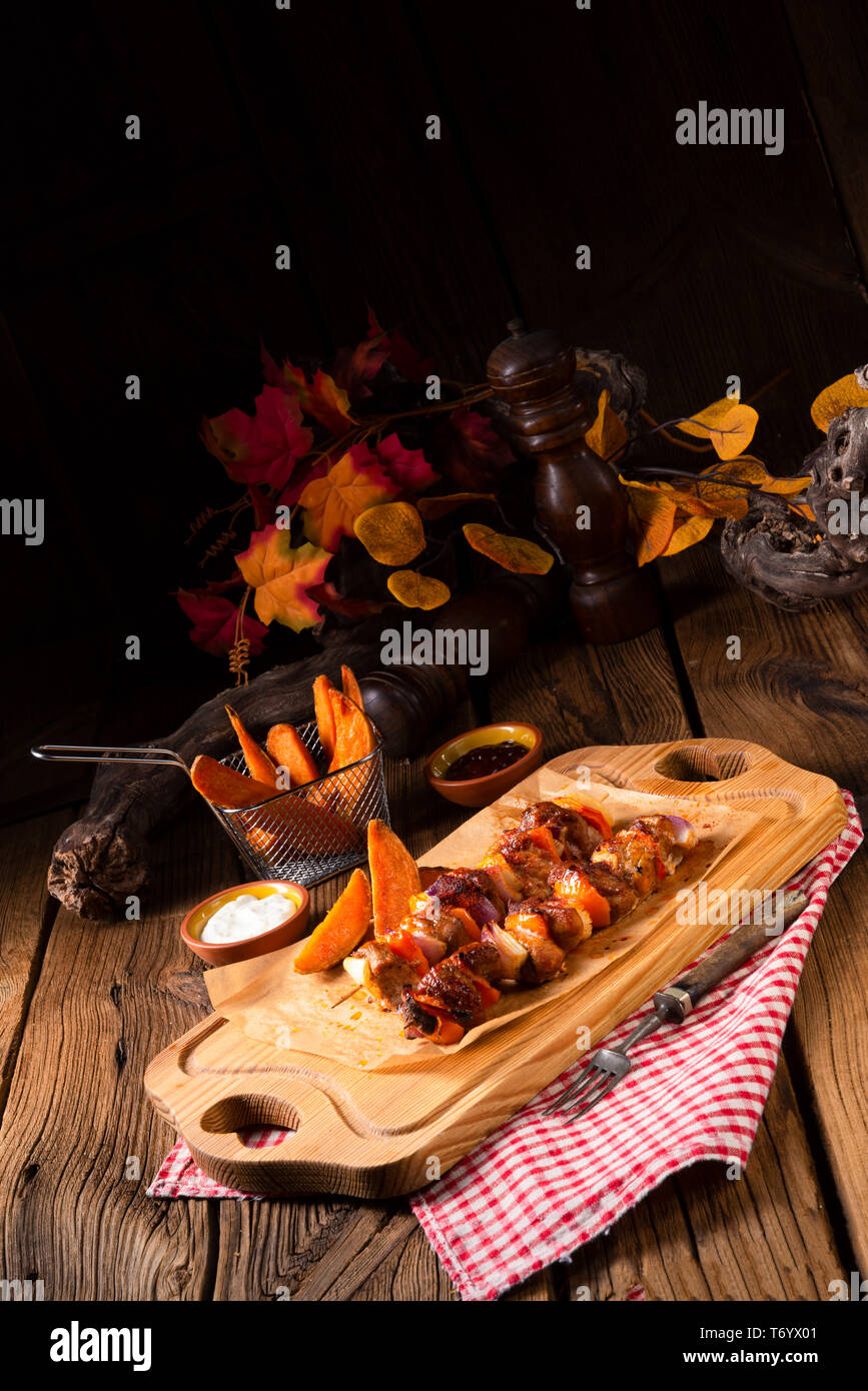 sweet potato fries with spicy paprika shashlik Stock Photo Alamy