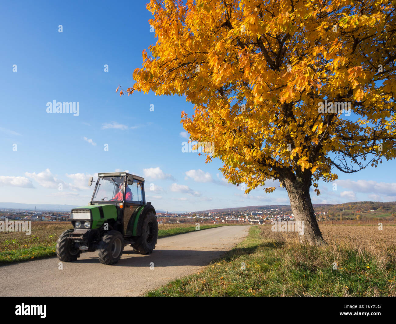 Rural scene with tractor Stock Photo