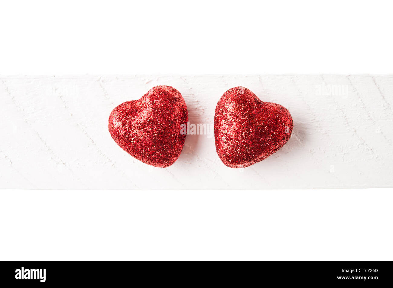 Two red glitter hearts valentines day background Stock Photo