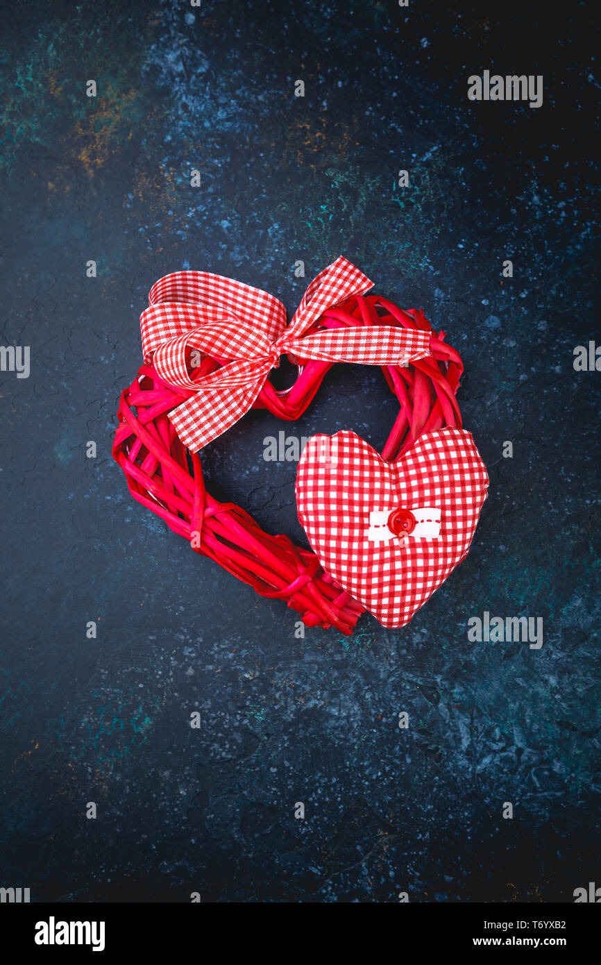 Valentines day background with two red hearts Stock Photo - Alamy