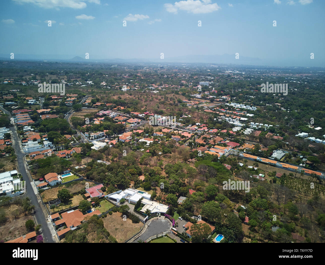 Streets in Managua city aerial above drone top view Stock Photo