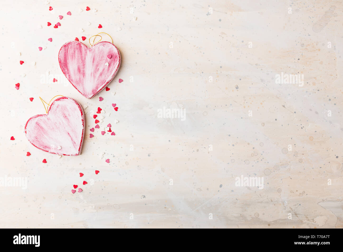 Valentines day background with two red hearts Stock Photo - Alamy