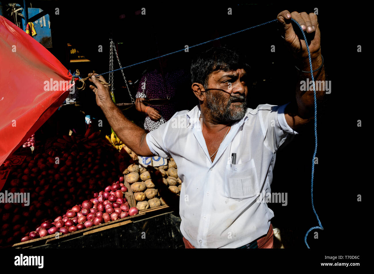 Vendor setting up shop in Kandy Municipal Central Market, Kandy, Sri ...