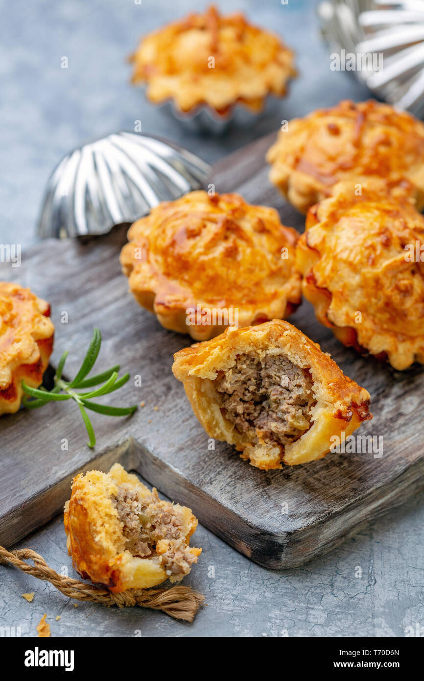 Homemade mini-pies with meat filling. Stock Photo