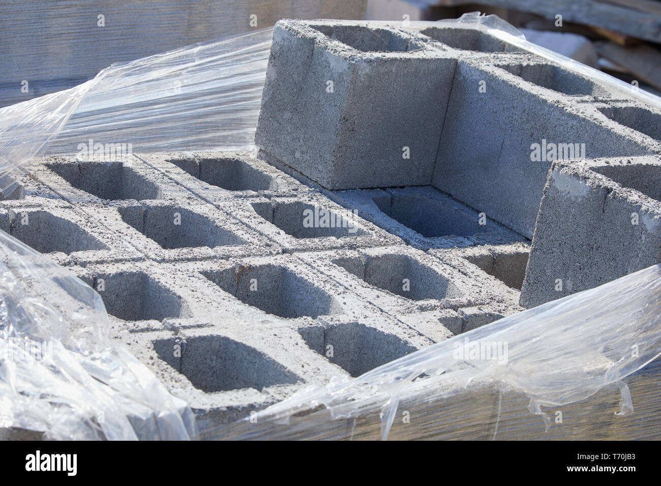 Concrete block bricks in stack for wall construction. Concrete block