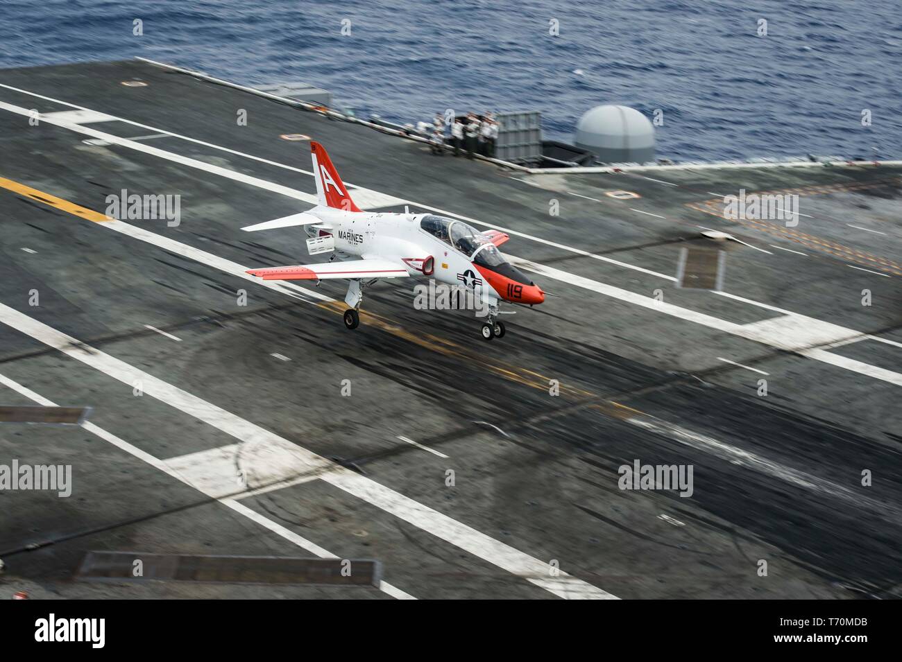 190502-N-KT825-0005  ATLANTIC OCEAN (May 2, 2019) A T-45C Goshawk training aircraft assigned to Training Air Wing (TW) 2 lands on the flight deck aboard the aircraft carrier USS Dwight D. Eisenhower (CVN 69). Ike is underway in the Atlantic Ocean conducting carrier qualifications while in the basic phase of the Optimized Fleet Response Plan. (U.S. Navy photo by Mass Communication Specialist Seaman Sawyer Haskins) Stock Photo