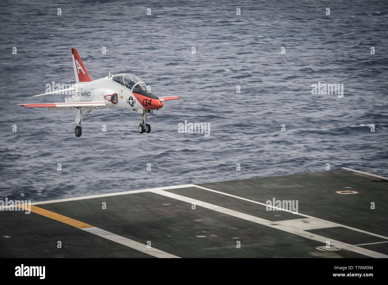 190502-N-KT825-0063  ATLANTIC OCEAN (May 2, 2019) A T-45C Goshawk training aircraft assigned to Training Air Wing (TW) 2 lands on the flight deck aboard the aircraft carrier USS Dwight D. Eisenhower (CVN 69). Ike is underway in the Atlantic Ocean conducting carrier qualifications while in the basic phase of the Optimized Fleet Response Plan. (U.S. Navy photo by Mass Communication Specialist Seaman Sawyer Haskins) Stock Photo