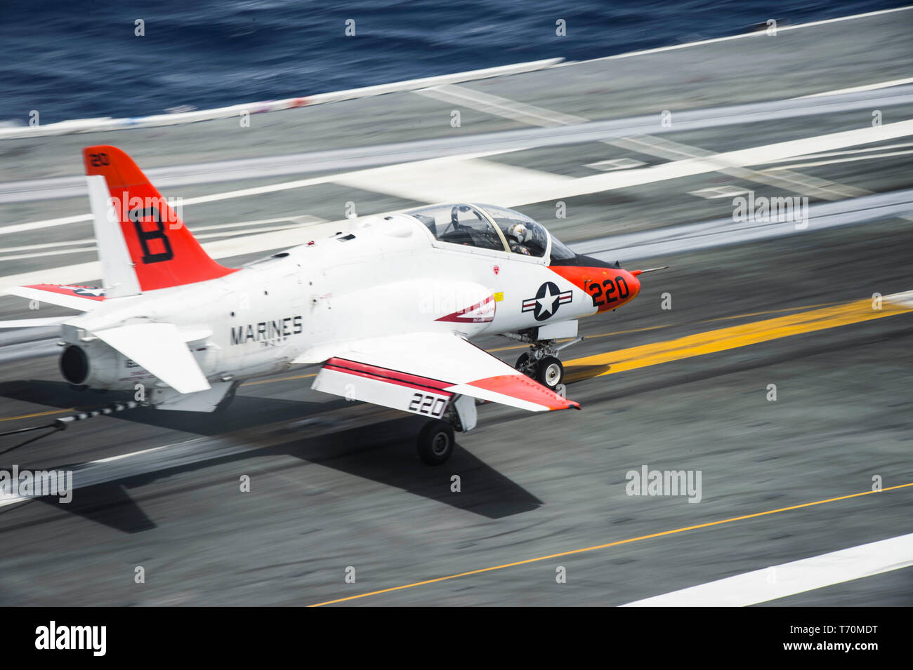 190502-N-KT825-0141  ATLANTIC OCEAN (May 2, 2019) A T-45C Goshawk training aircraft assigned to Training Air Wing (TW) 2 lands on the flight deck aboard the aircraft carrier USS Dwight D. Eisenhower (CVN 69). Ike is underway in the Atlantic Ocean conducting carrier qualifications while in the basic phase of the Optimized Fleet Response Plan. (U.S. Navy photo by Mass Communication Specialist Seaman Sawyer Haskins) Stock Photo