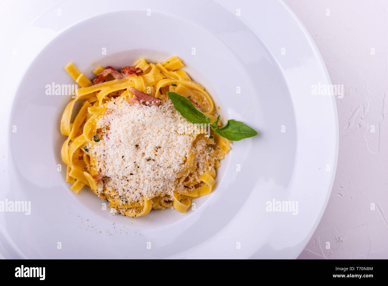 Classic Carbonara pasta, spaghetti with pancetta, bacon, egg, parmesan