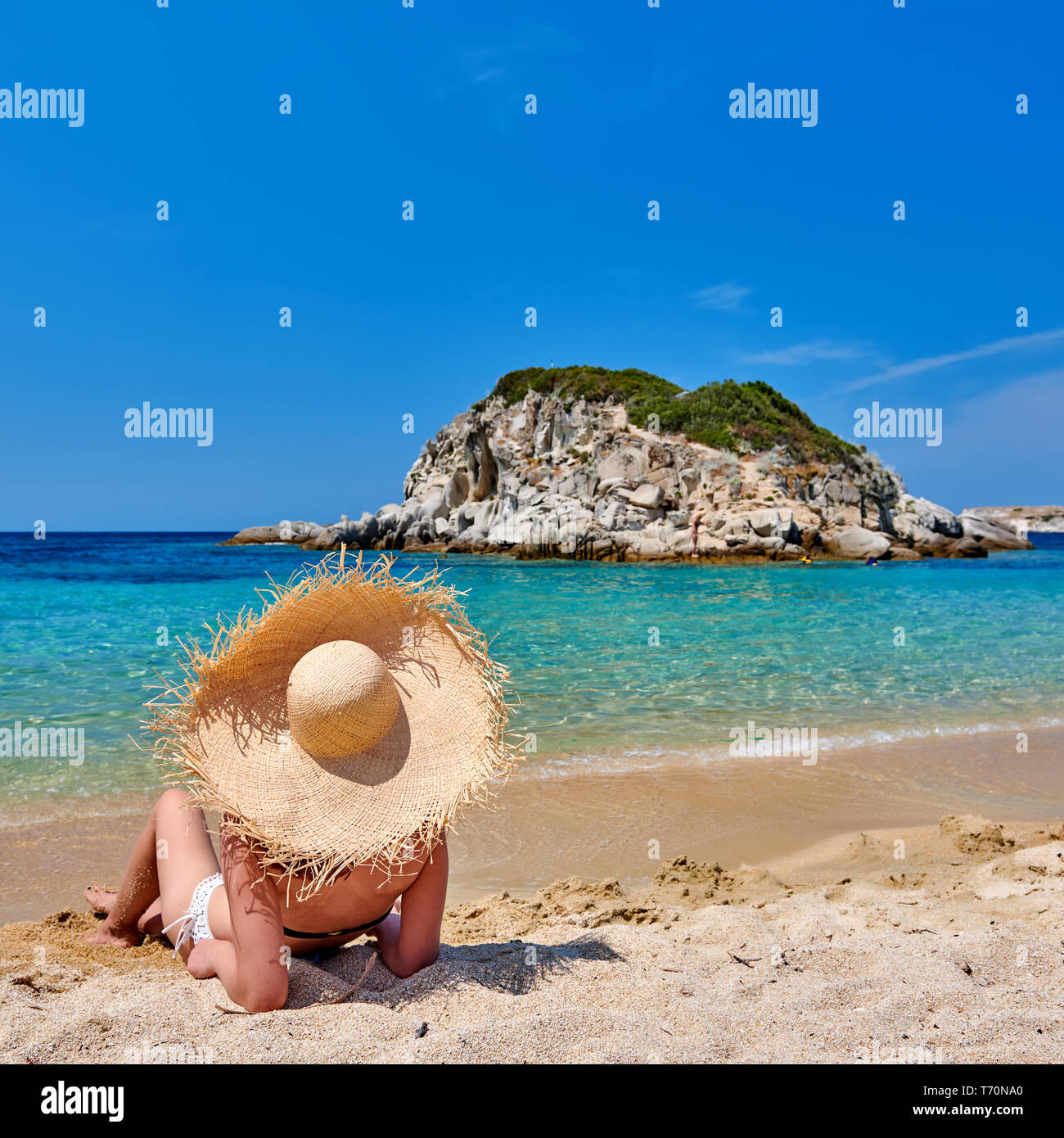 Woman in bikini on beach Stock Photo Alamy