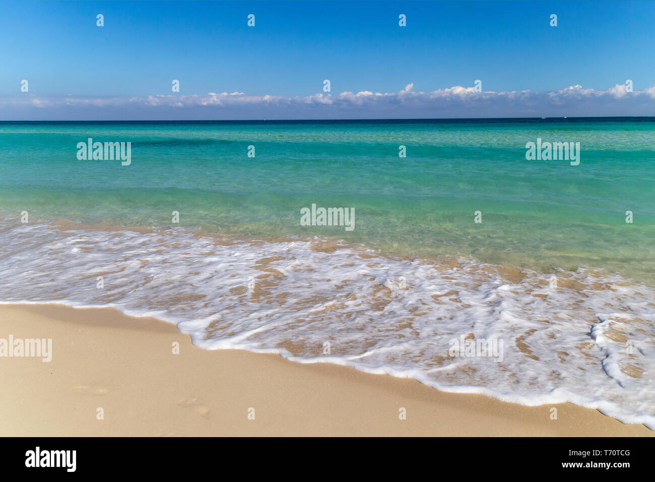 Background of tropical white sand beach and turquoise sea Stock Photo