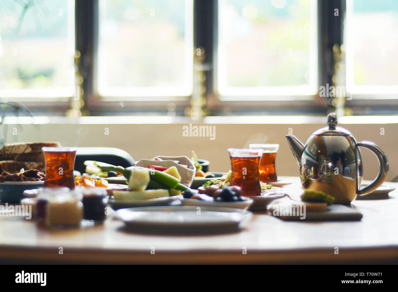 Turkish breakfast with various plates on a table Stock Photo
