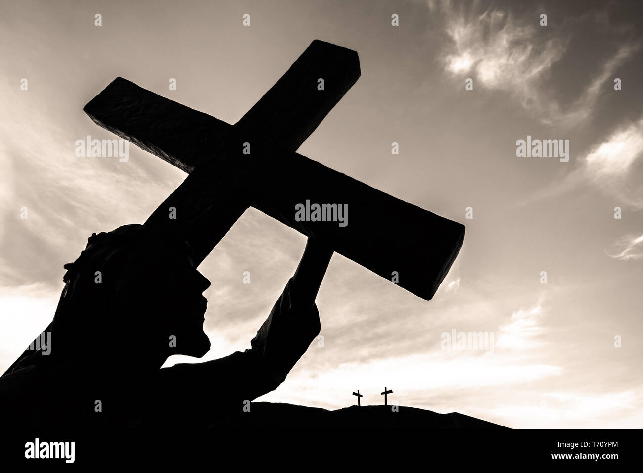 Statue jesus carrying cross hi-res stock photography and images - Alamy