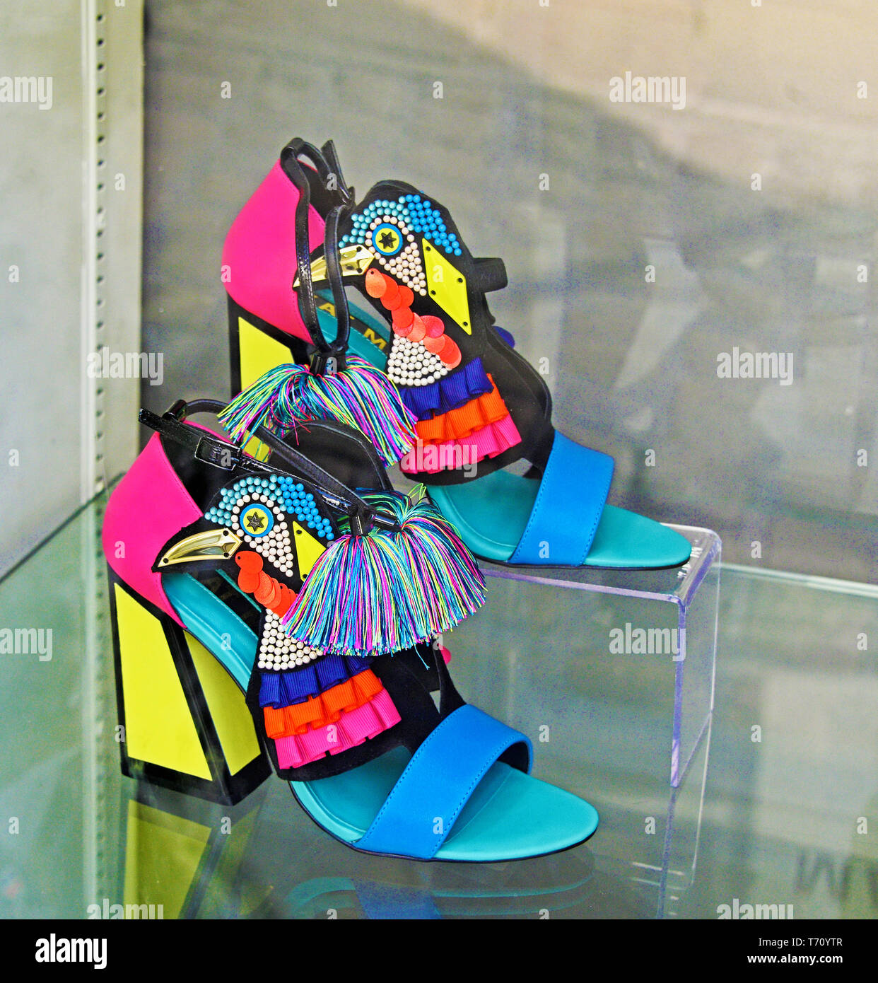 Shop window display of a pair of colourful, multicoloured, womens shoes. Jules B, Stramongate, Kendal, Cumbria, England, United Kingdom, Europe. Stock Photo