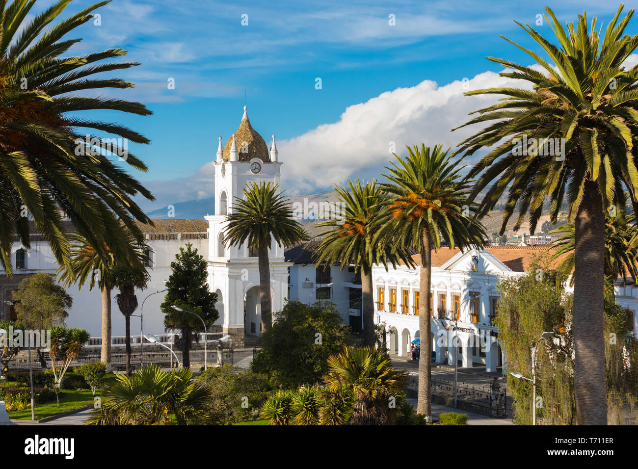 the Cathedral Latacunga Ecuador and Vincente Leon park with sun Stock Photo