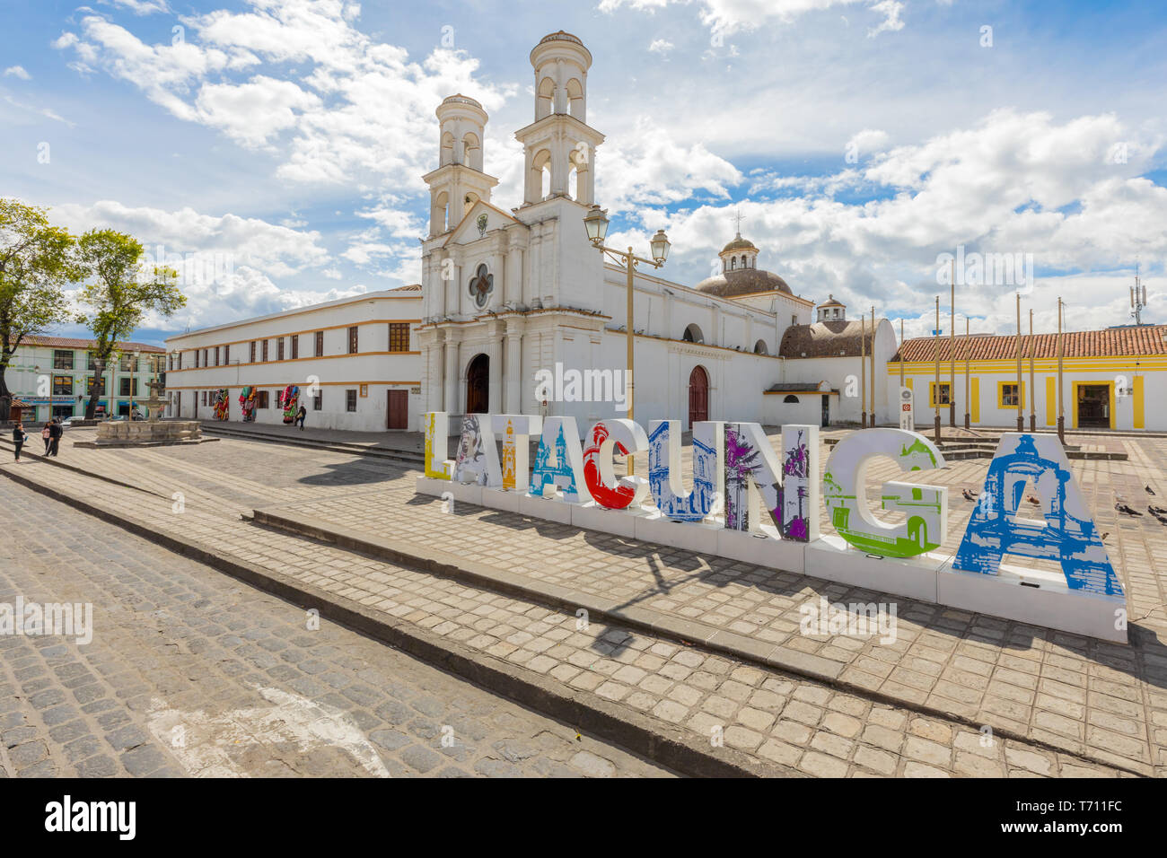 Merced church and signboard Latacunga Ecuador Stock Photo