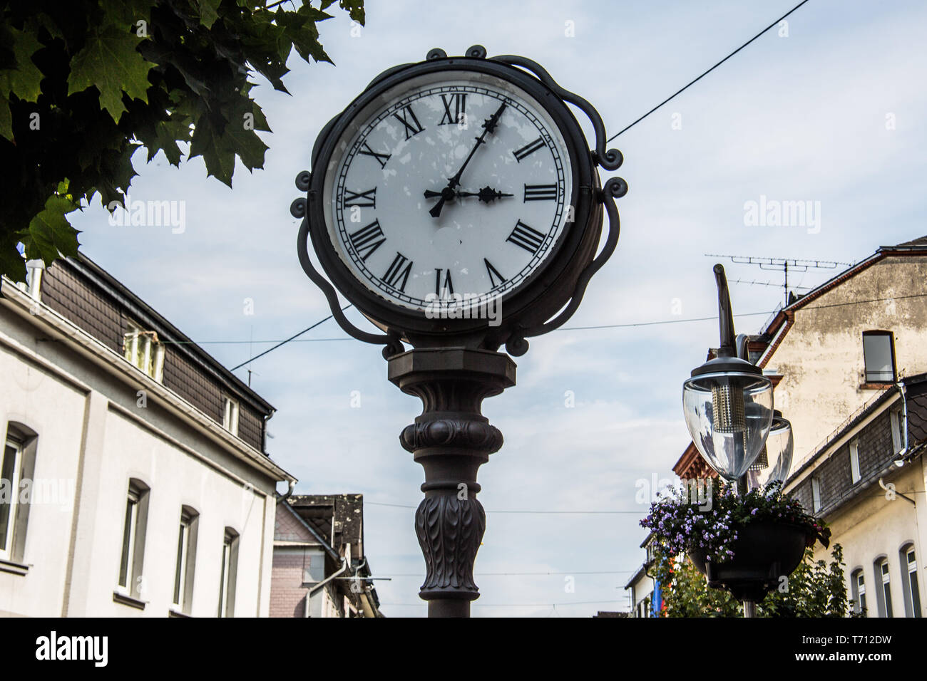 Grandfather clock in pedestrian zone Stock Photo
