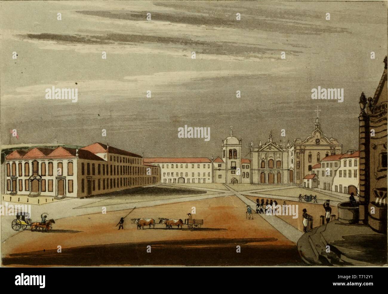 Color print depicting a cart drawn by a team of four cattle, and several people, including a group of chained, dark-skinned men, standing and walking in a wide main square, the Pra  a XV de Novembro (15 November Square) with a view of the Pa  o Imperial (Imperial Palace) located in central Rio de Janeiro, published in John Mawe's 'Travels in the Interior of Brazil: with notices on its climate, agriculture, commerce, population, mines, manners, and customs: and a particular account of the gold and diamond districts: including a voyage to the Rio de La Plata', 1822. Courtesy Internet Archive. () Stock Photo