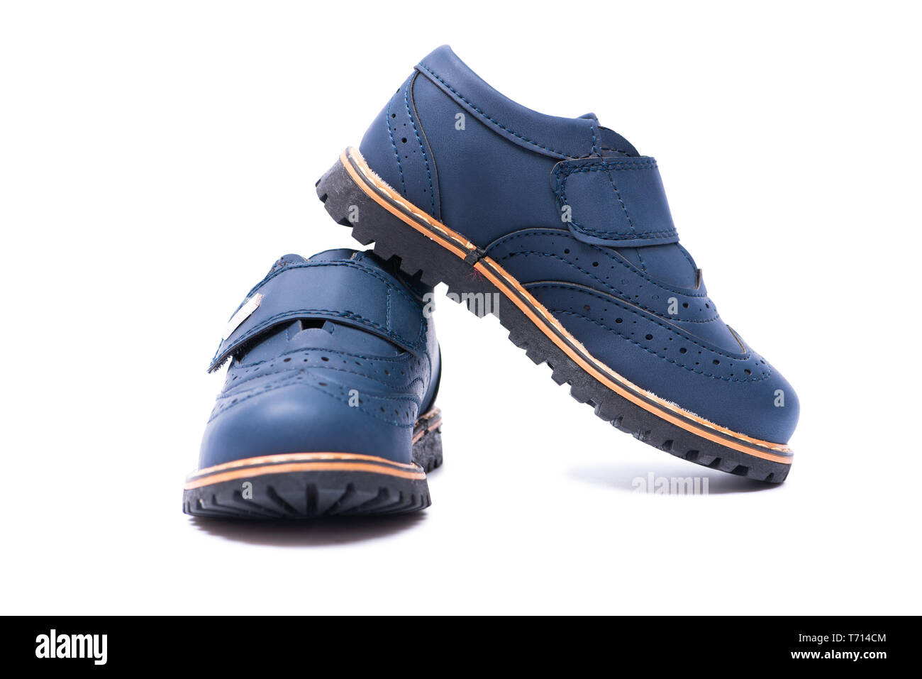 Blue baby shoes isolated on white background Stock Photo - Alamy