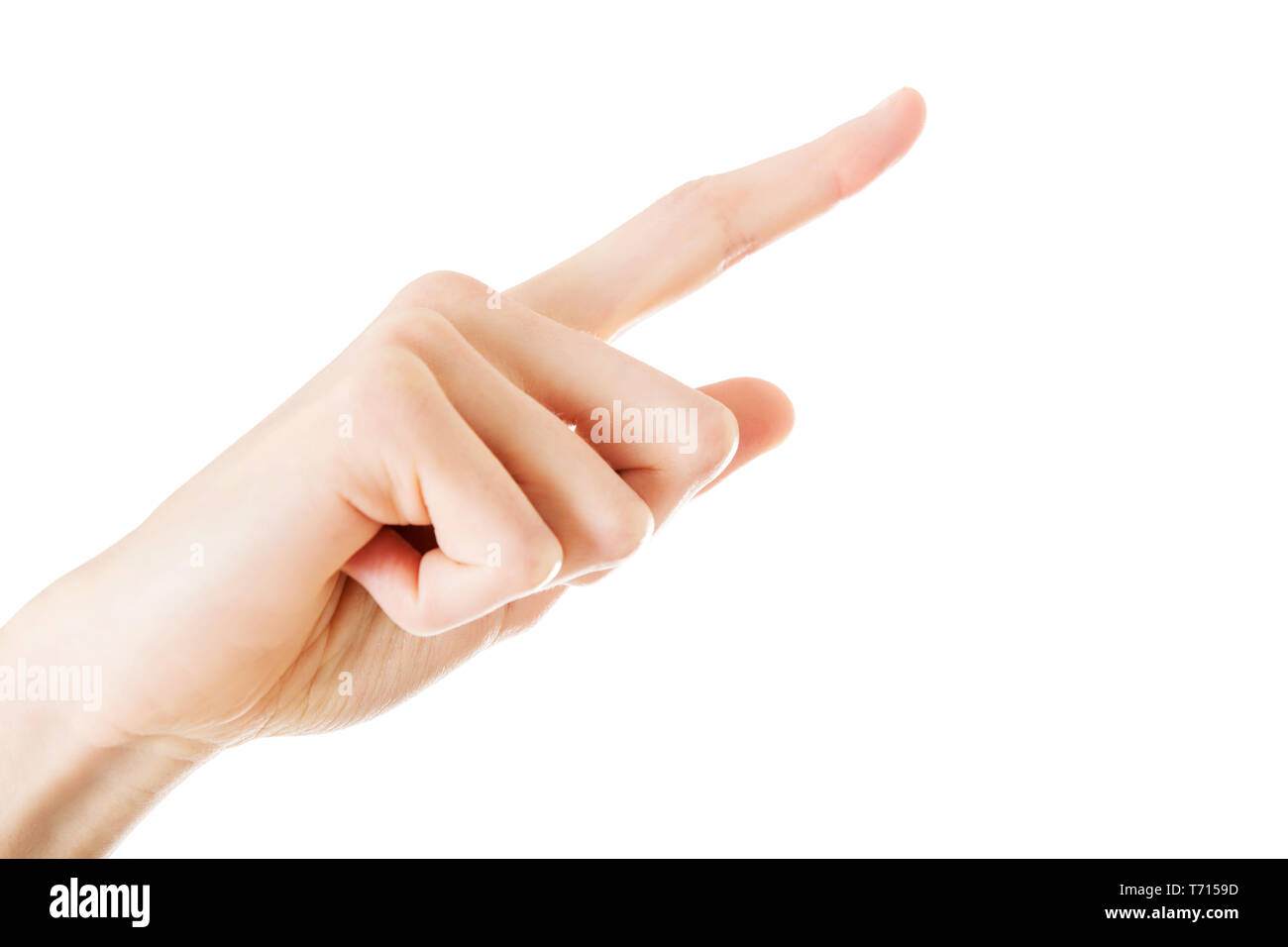 Female hand with finger showing or pressing something on white background. Stock Photo