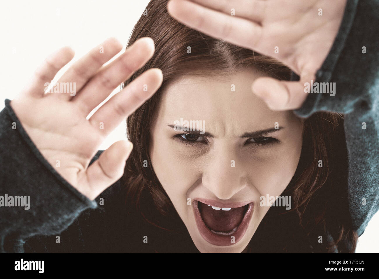 Above view of scared young woman afraid of something over her Stock ...