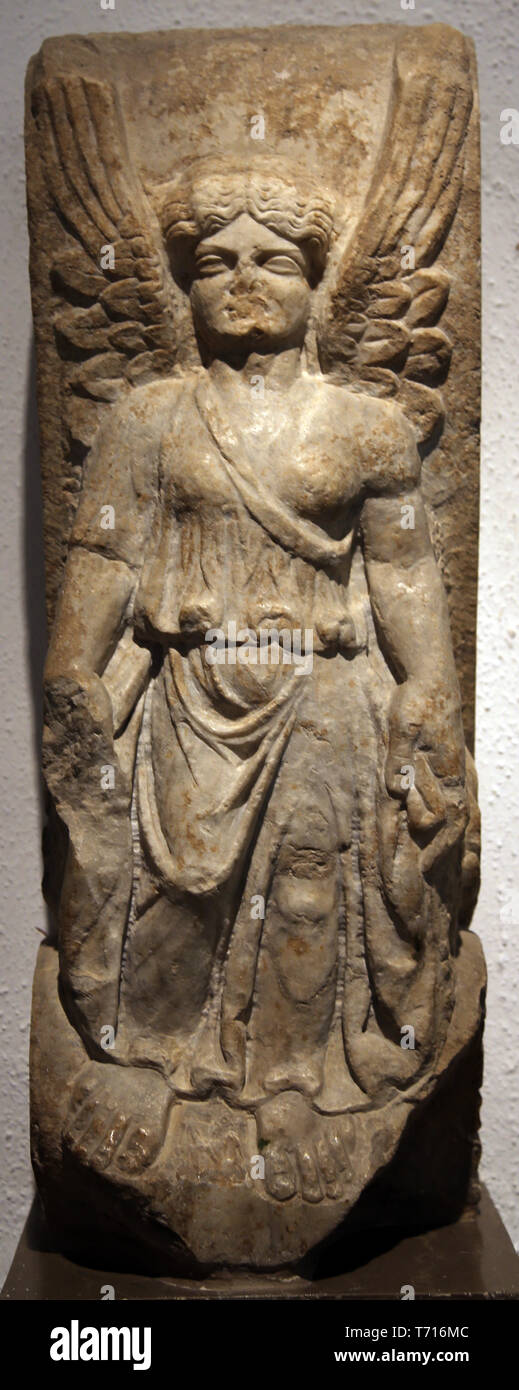 Corbel of a triumphal arch. Relief of a goddess Victoria. 2nd century. Italica. Archaeological Museum of Seville. Andalusia. Spain. Stock Photo