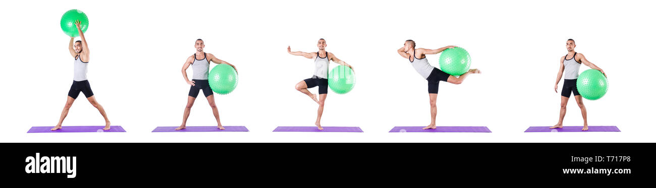 Man with swiss ball doing exercises on white Stock Photo - Alamy