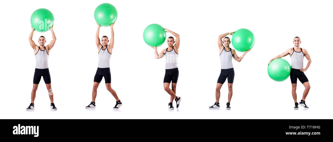 Man with swiss ball doing exercises on white Stock Photo - Alamy