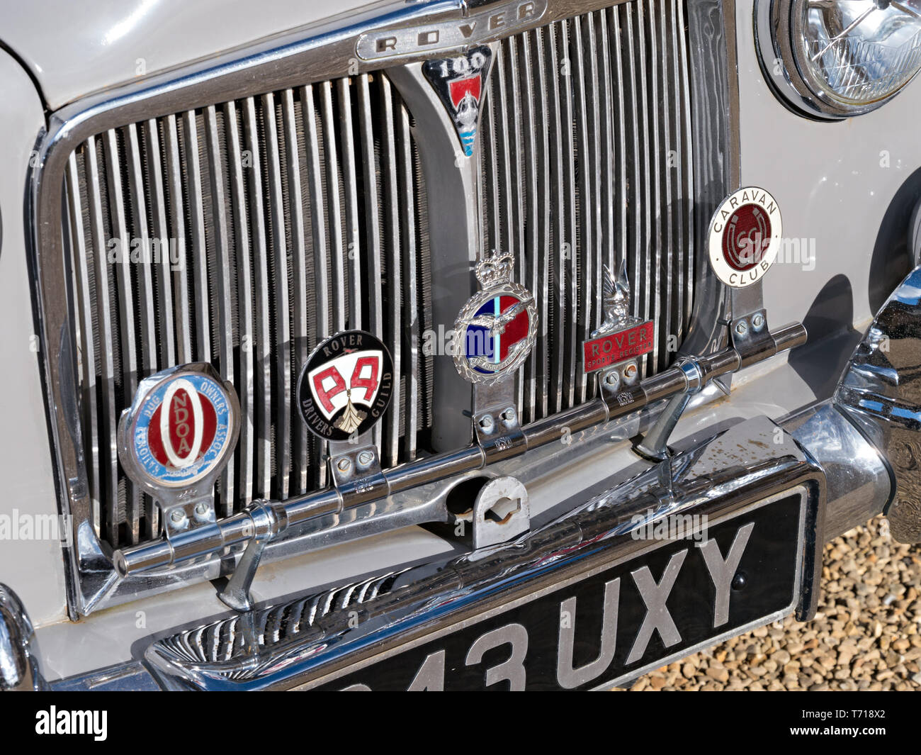 Rover P4 100 Classic Vintage Car showing detail of front radiator grille bumper and club badges, England, UK Stock Photo