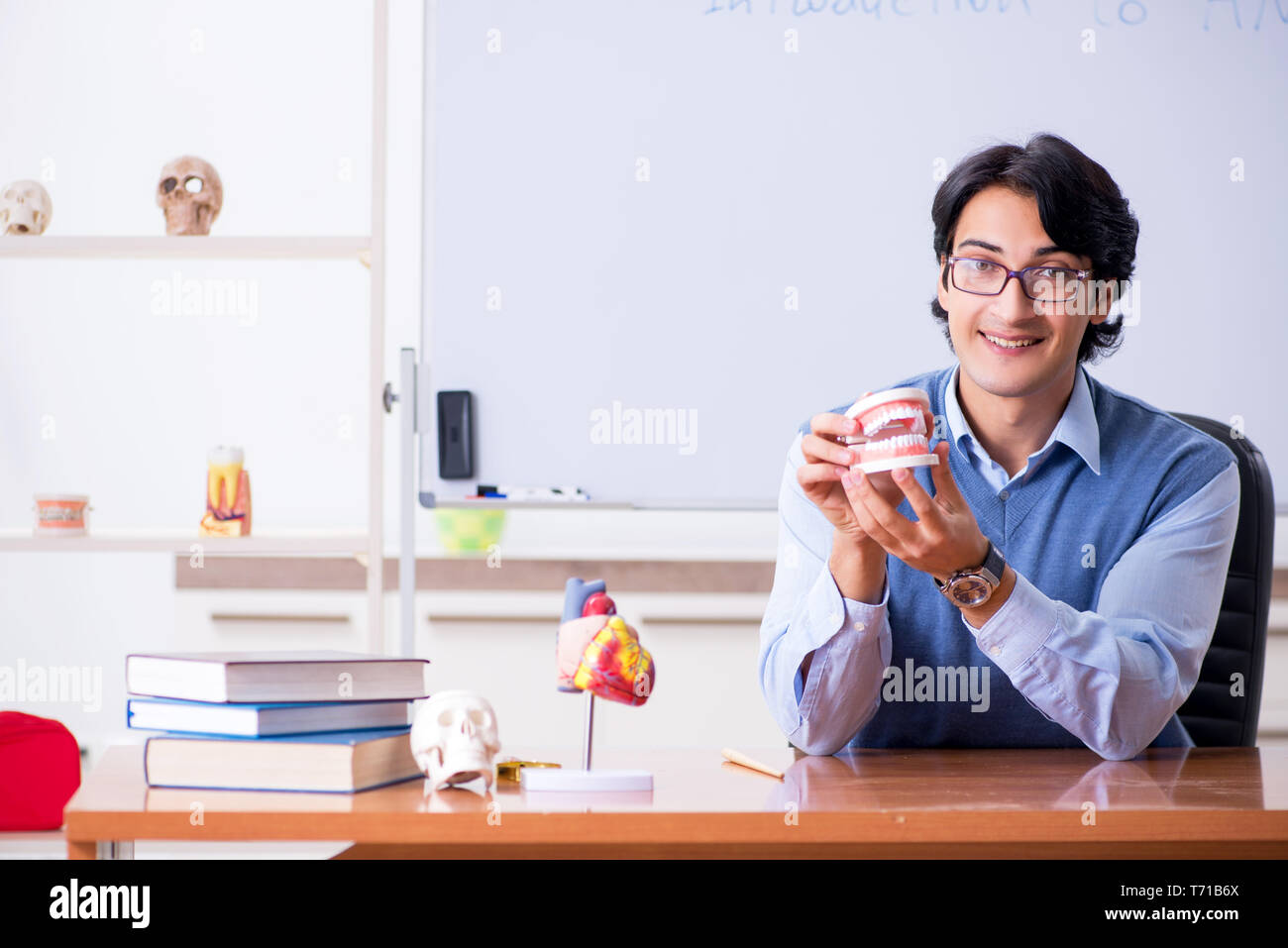 Young lecturer teacher teaching anatomy Stock Photo