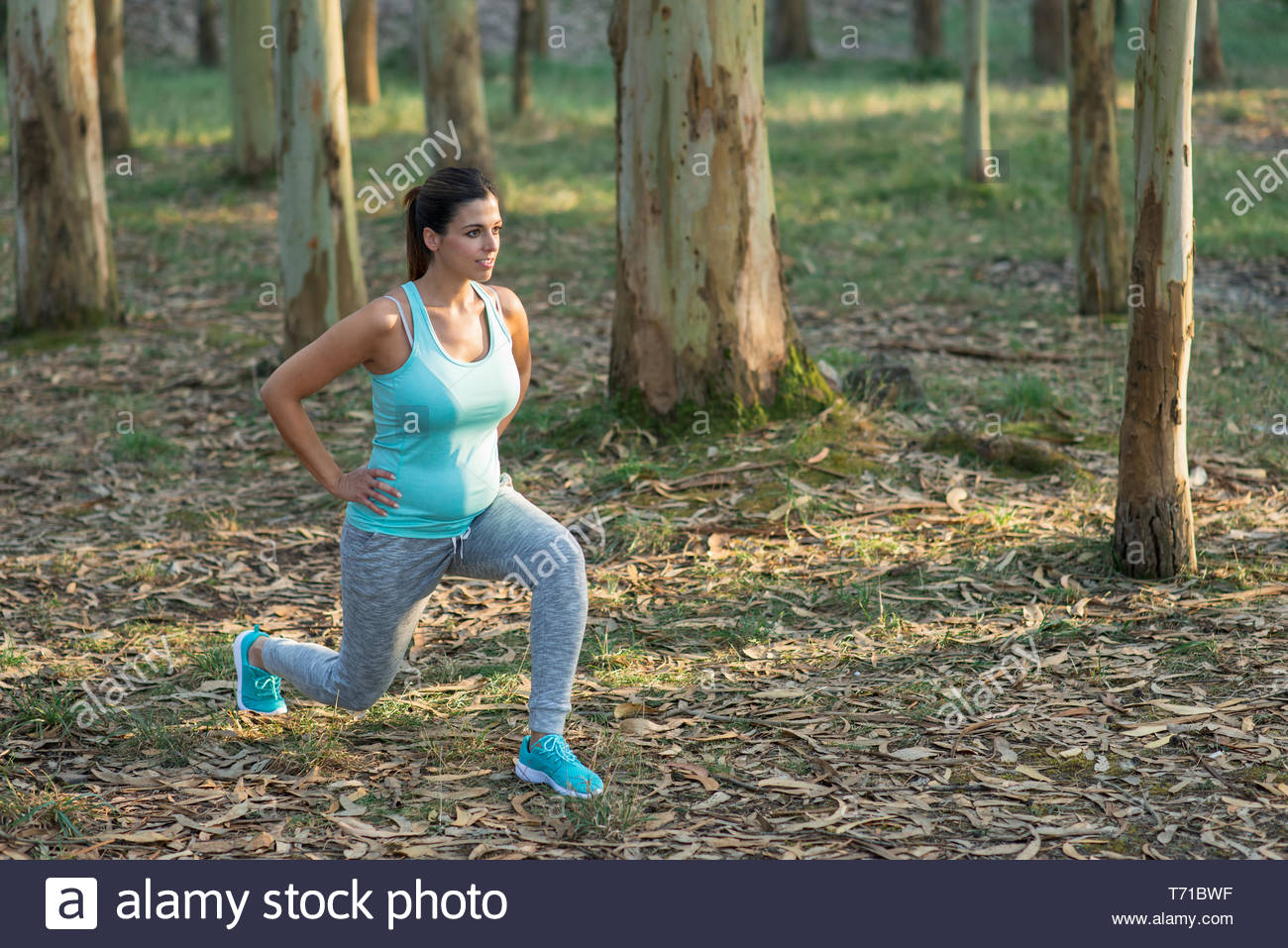 Fitness Pregnant Woman Doing Lunges For Strengthen Pelvic Floor