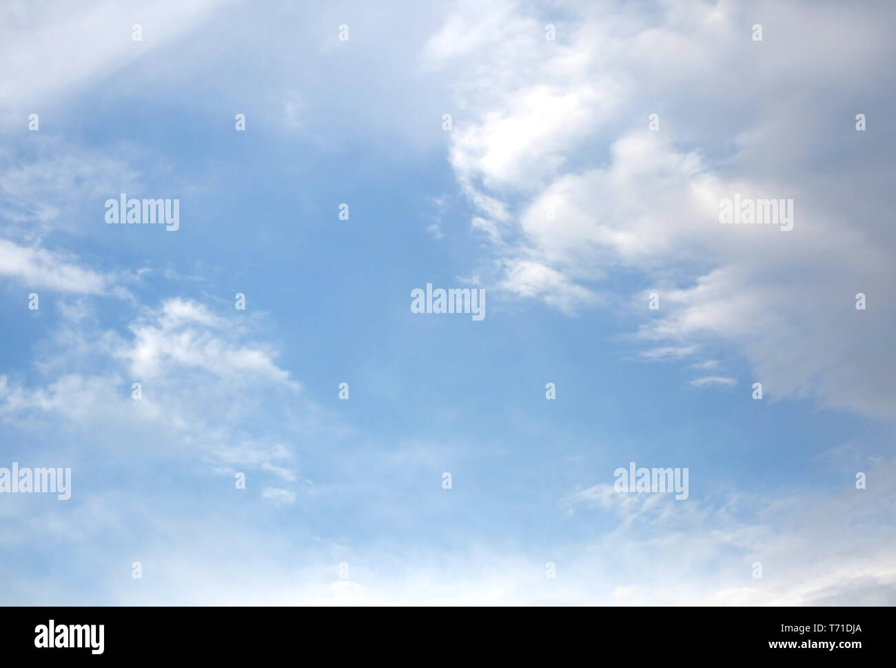 many white clouds on the light blue sky Stock Photo - Alamy