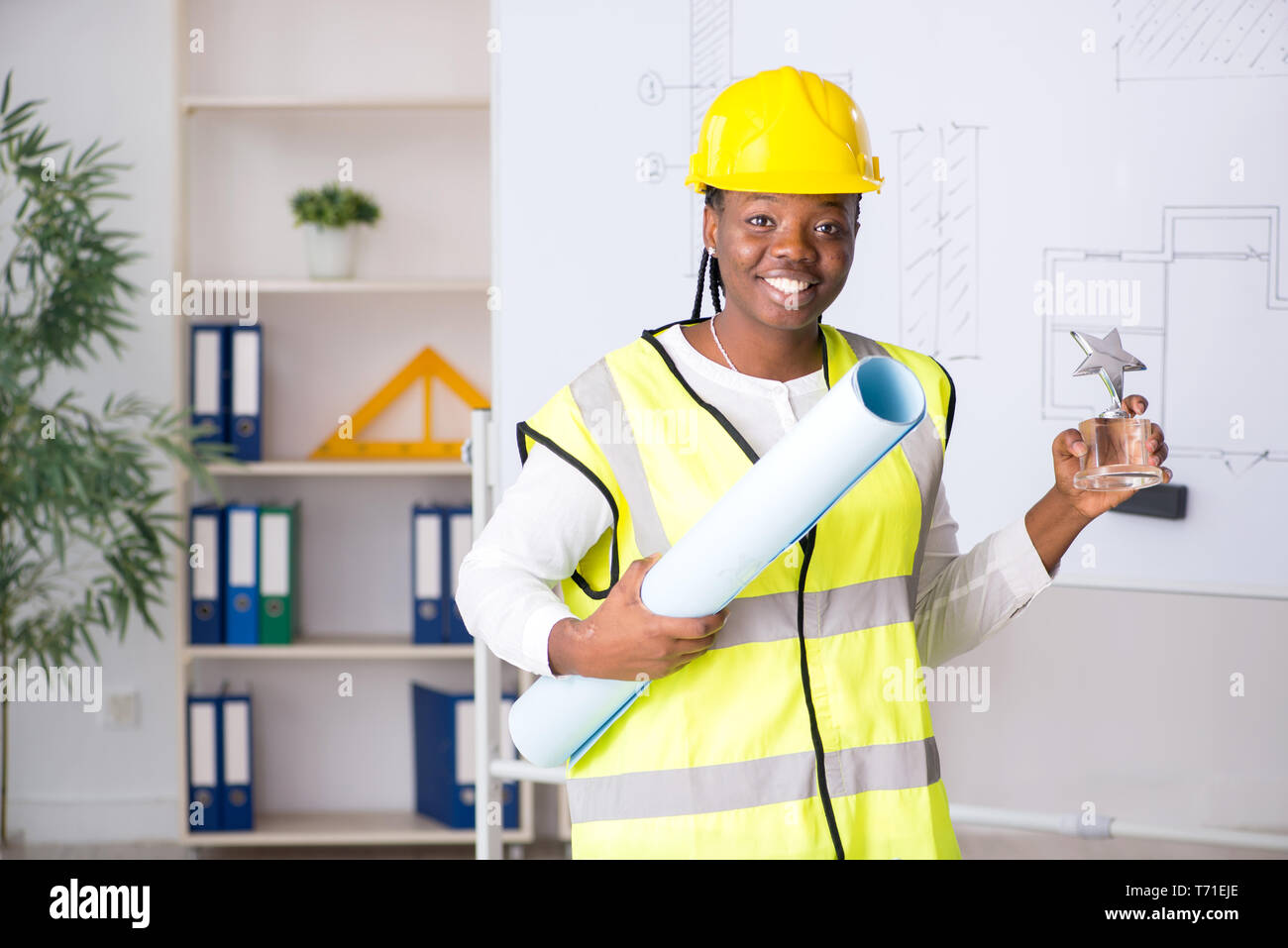 Young black architect working on project Stock Photo