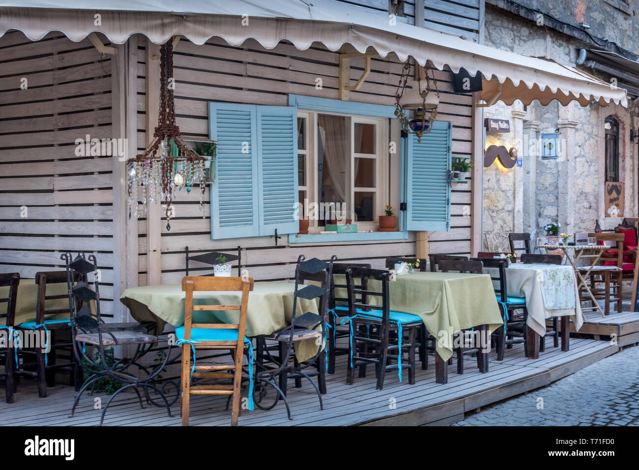 Alacati, Turkey - May 3 2019: the picturesque streets and restaurants of Alacati in Izmir, Turkey Urla Stock Photo