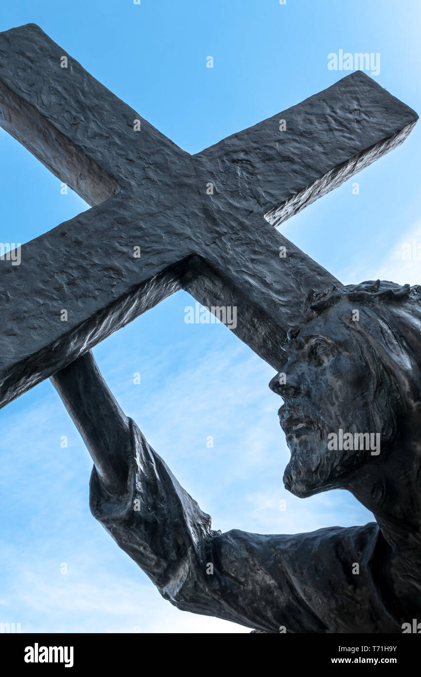 Statue jesus carrying cross hi-res stock photography and images - Alamy