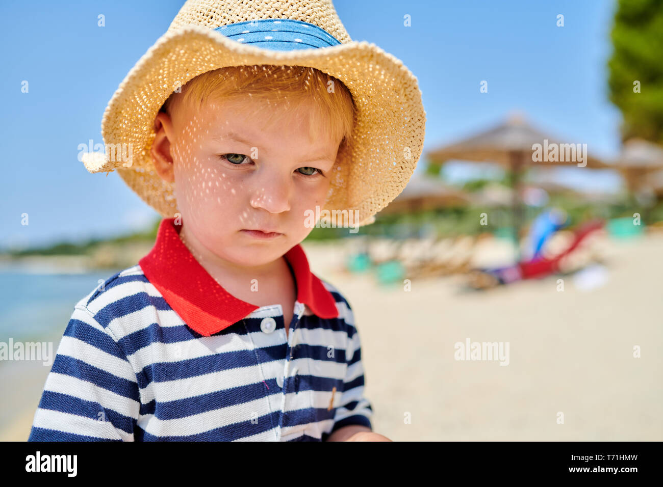 Toddler boy on beach Stock Photo