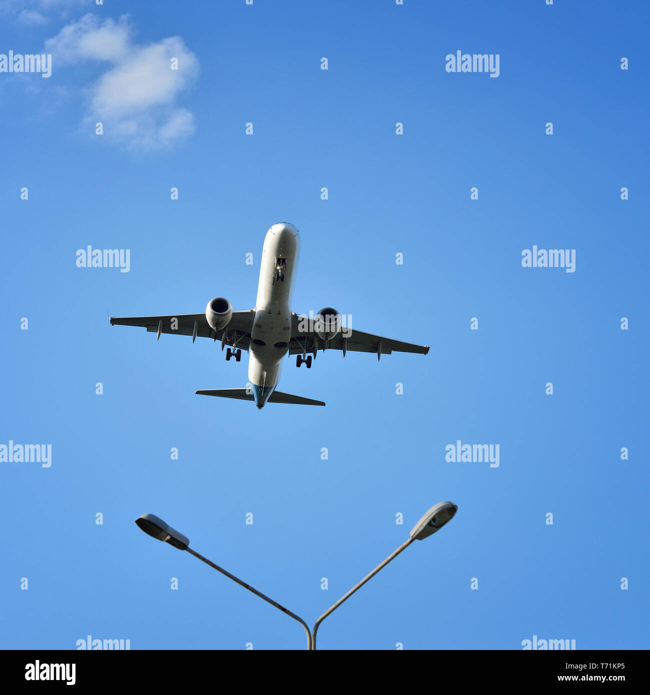 aircraft flies in the sky Stock Photo - Alamy
