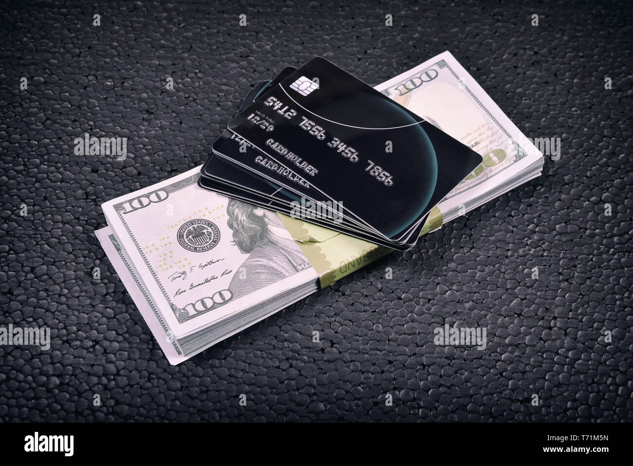 credit cards and a pack of dollars  Stock Photo