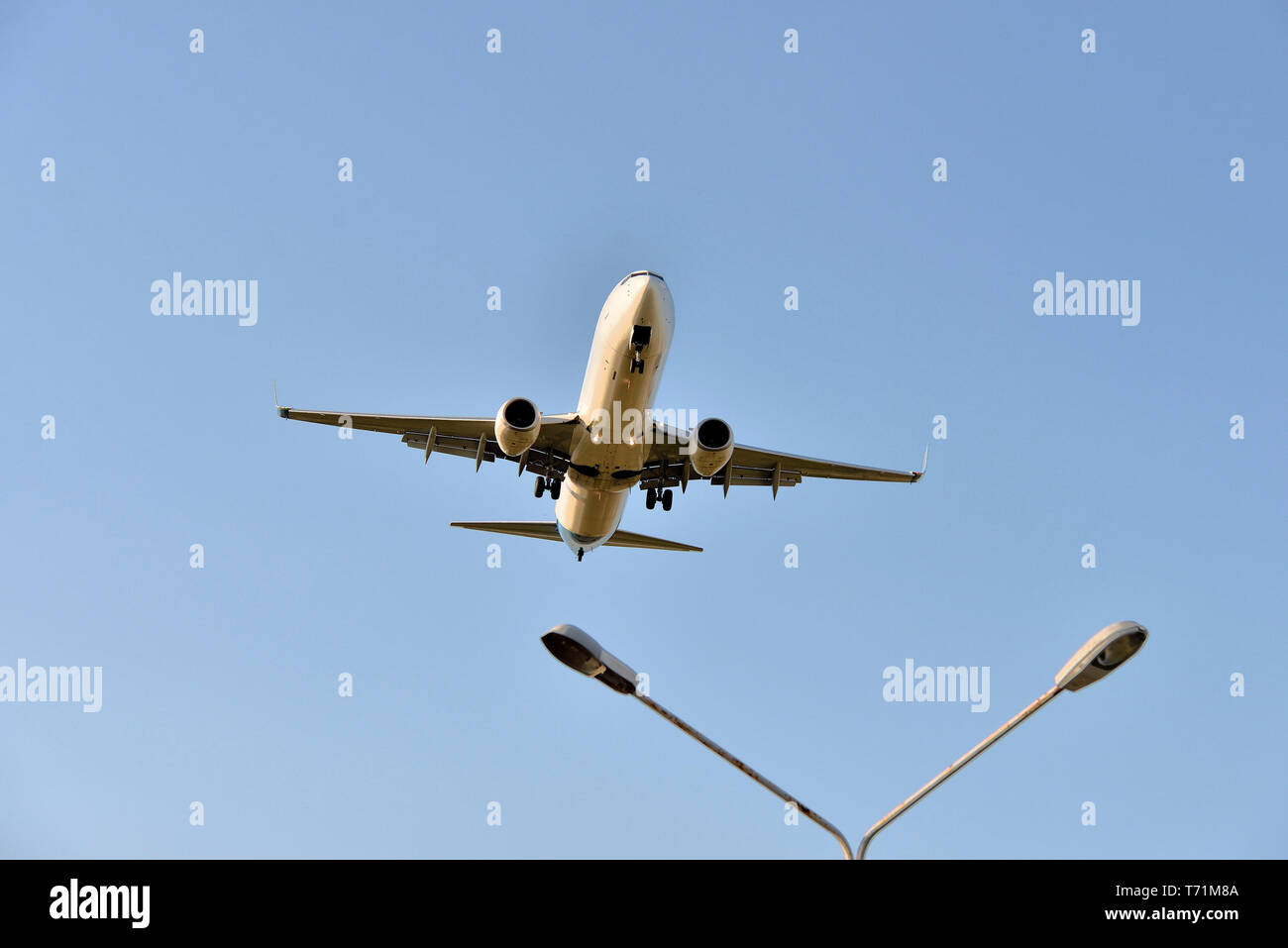 aircraft flies in the sky Stock Photo - Alamy