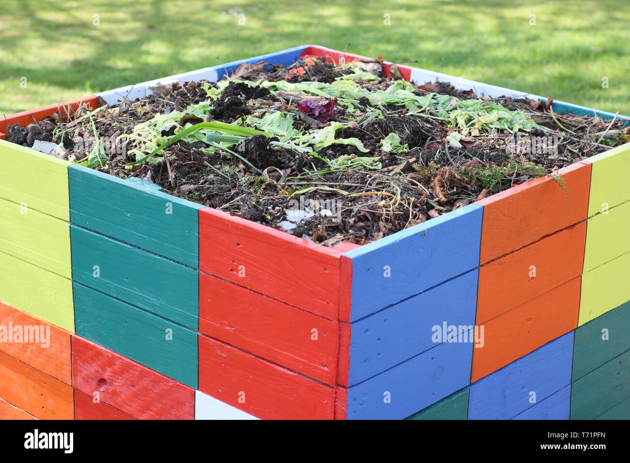Compost bin. Compost enclosure made from recycled wooden pallets, UK