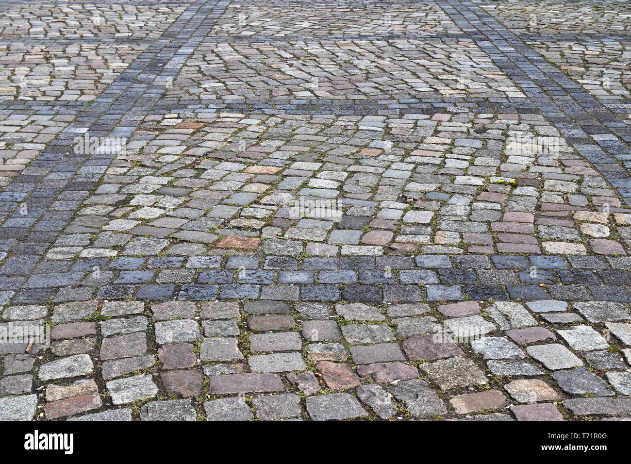 Detailed close views on cobblestone streets and sidewalks in different ...