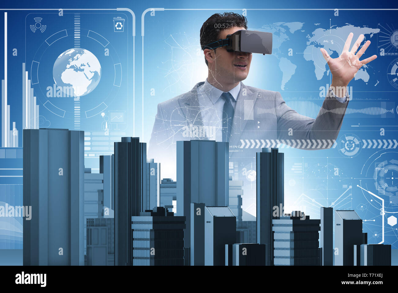 Man with virtual reality goggles doing urban planning Stock Photo
