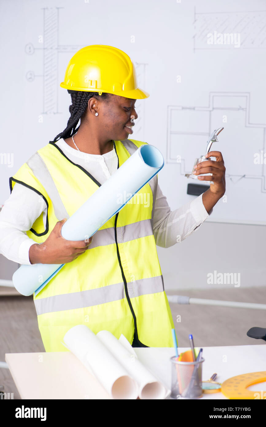 Young black architect working on project Stock Photo